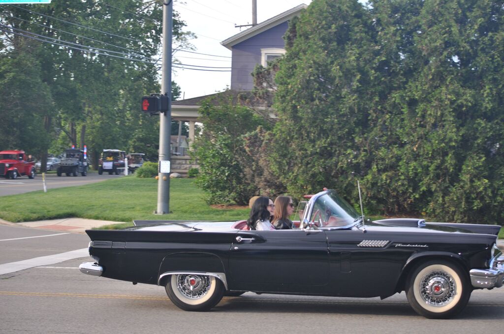 THS students in an old car on their way to school during the senior parade.