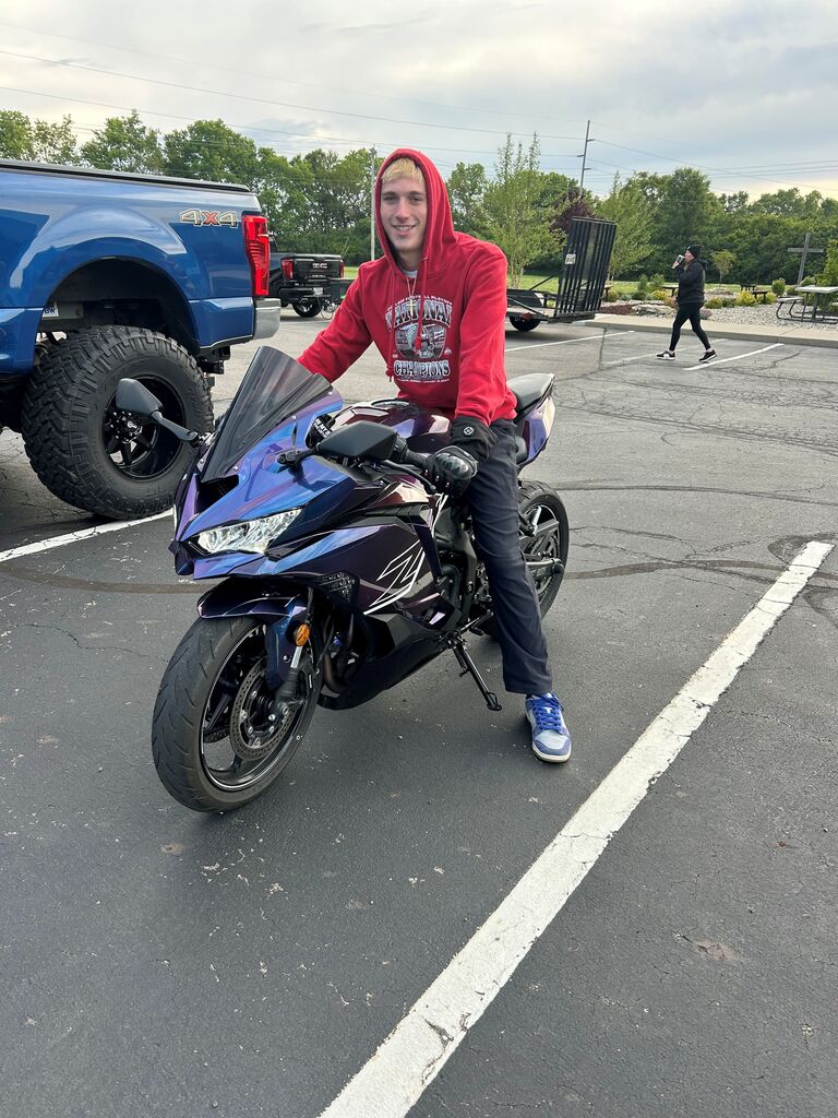 A THS student on his motorcyle for the senior parade.