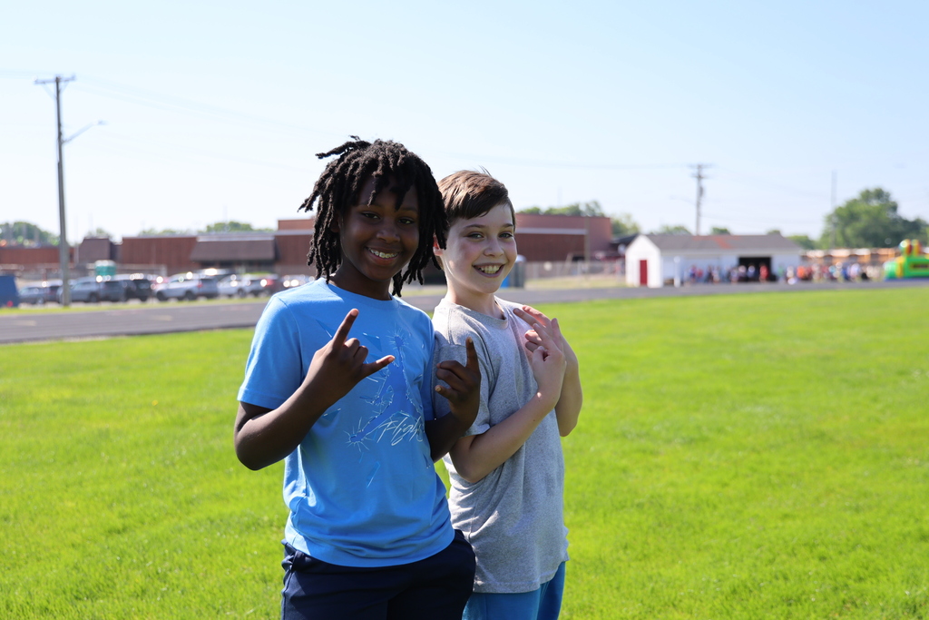 Posing for the camera at LT Ball field day.