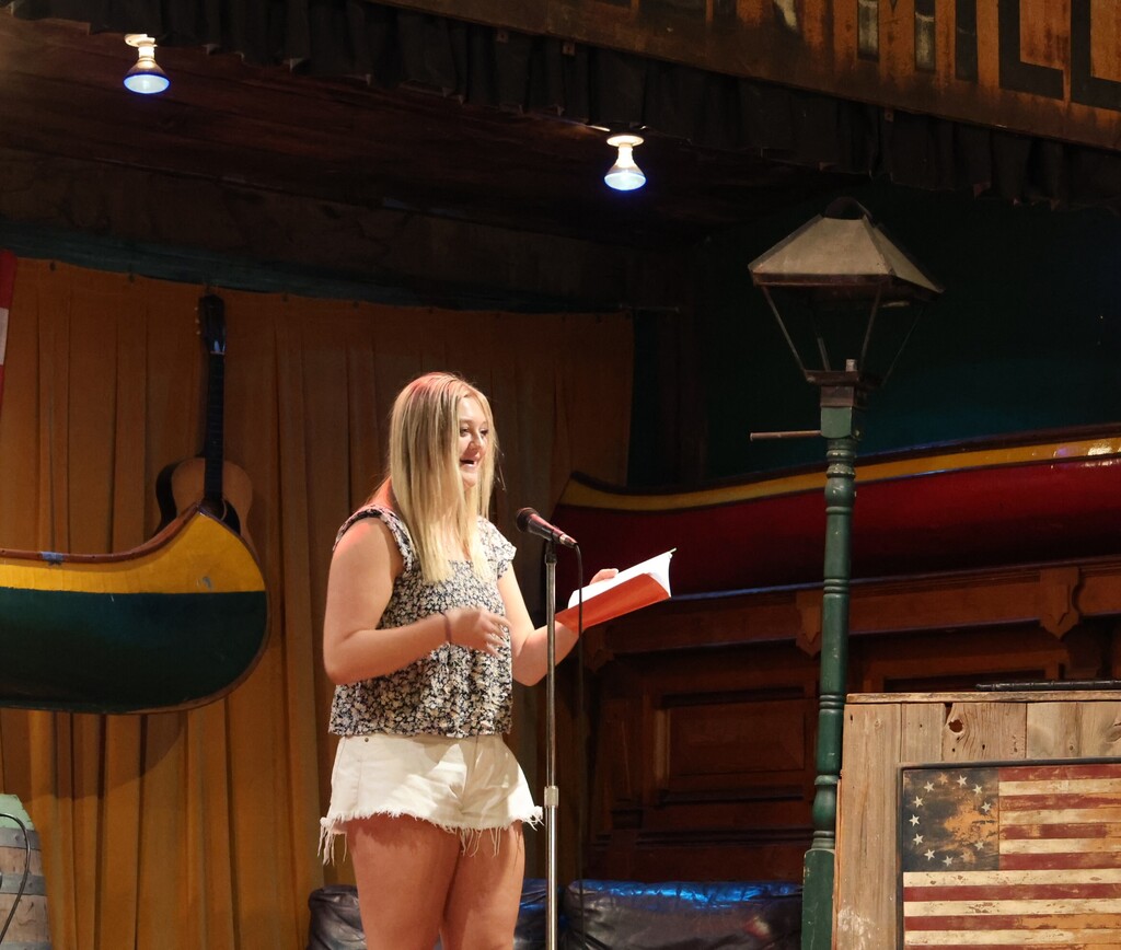 THS hosted the Inferno Book Release.  A student reads her work.