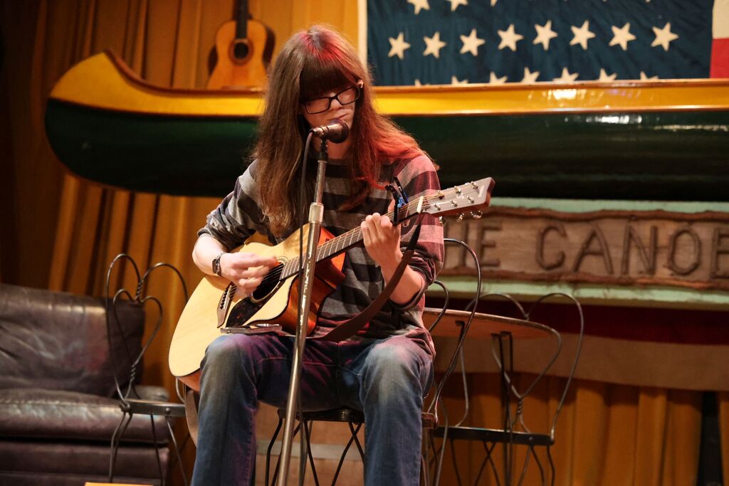 Student performs at the Inferno Book Release.