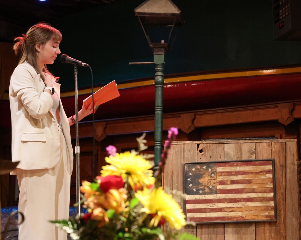 THS hosted the Inferno Book Release.  A student reads her work.