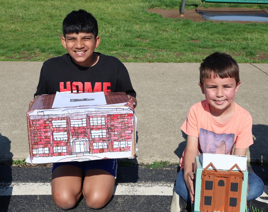  LT Ball students show  off the Tipp City float created for class.  