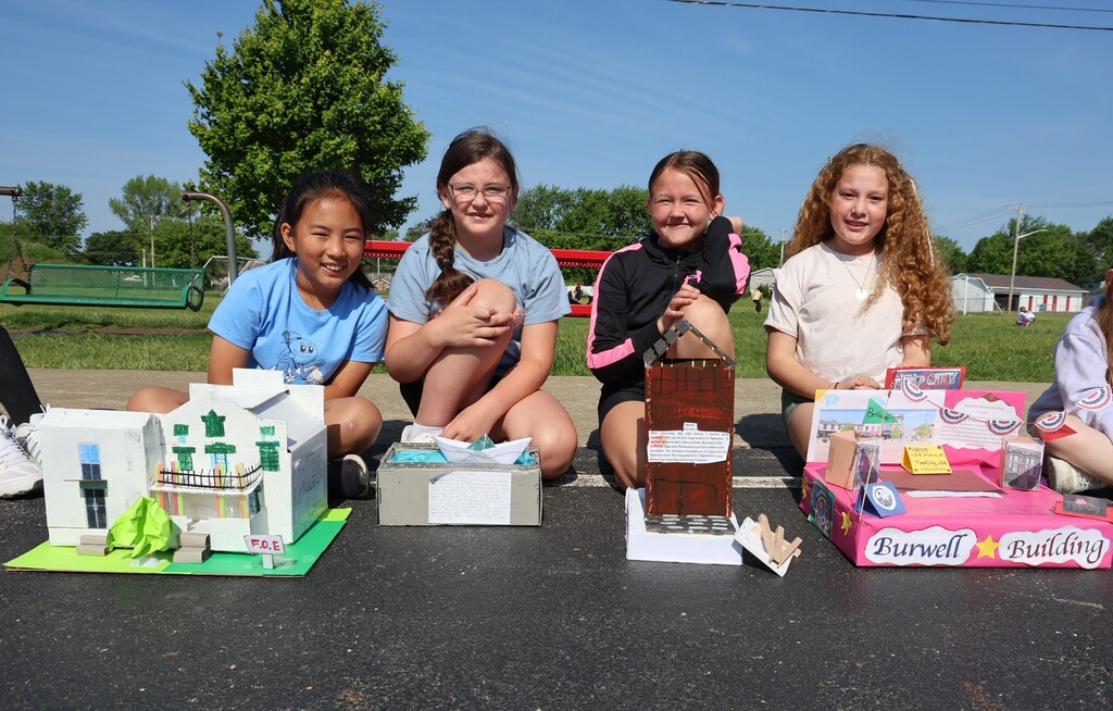 LT Ball students show off the Tipp City floats created for class.  
