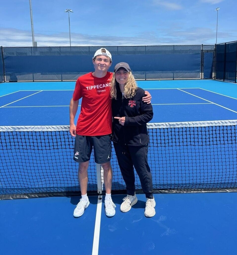 THS tennis player Nick Von Krosigk with his coach after his victories.