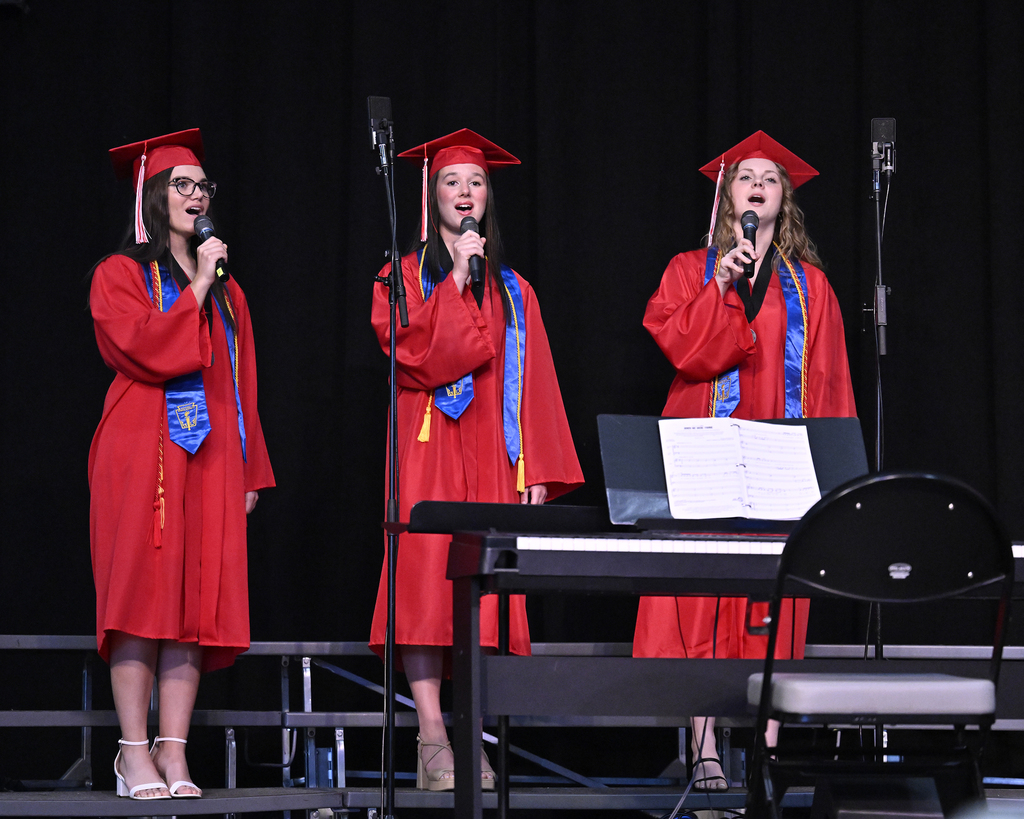 Students perform at their graduation.