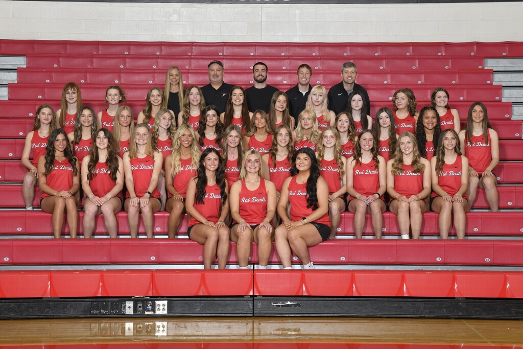 THS girls track and field team with their coaches.