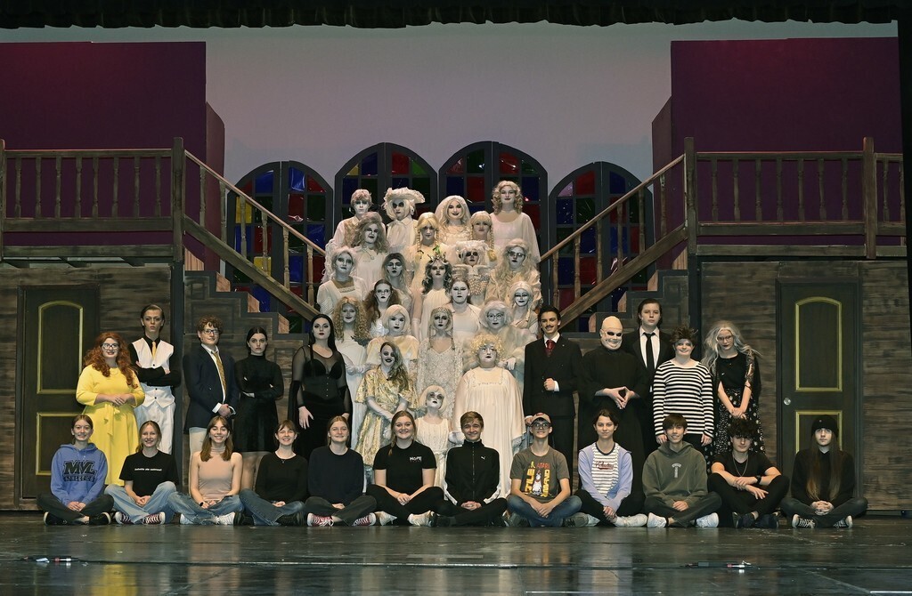 A photo of the cast and crew from The Addams Family spring musical.