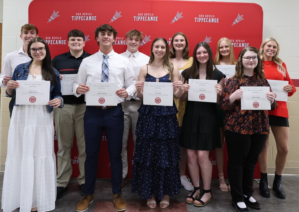 A group of THS students with their certificates after being awarded a $1,500 scholarship.