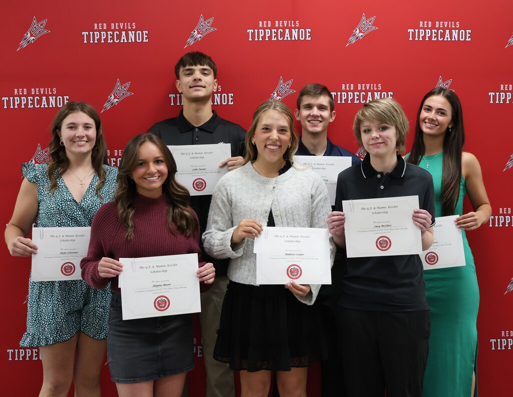 A group of THS students with their certificates after being awarded a $1,500 scholarship.