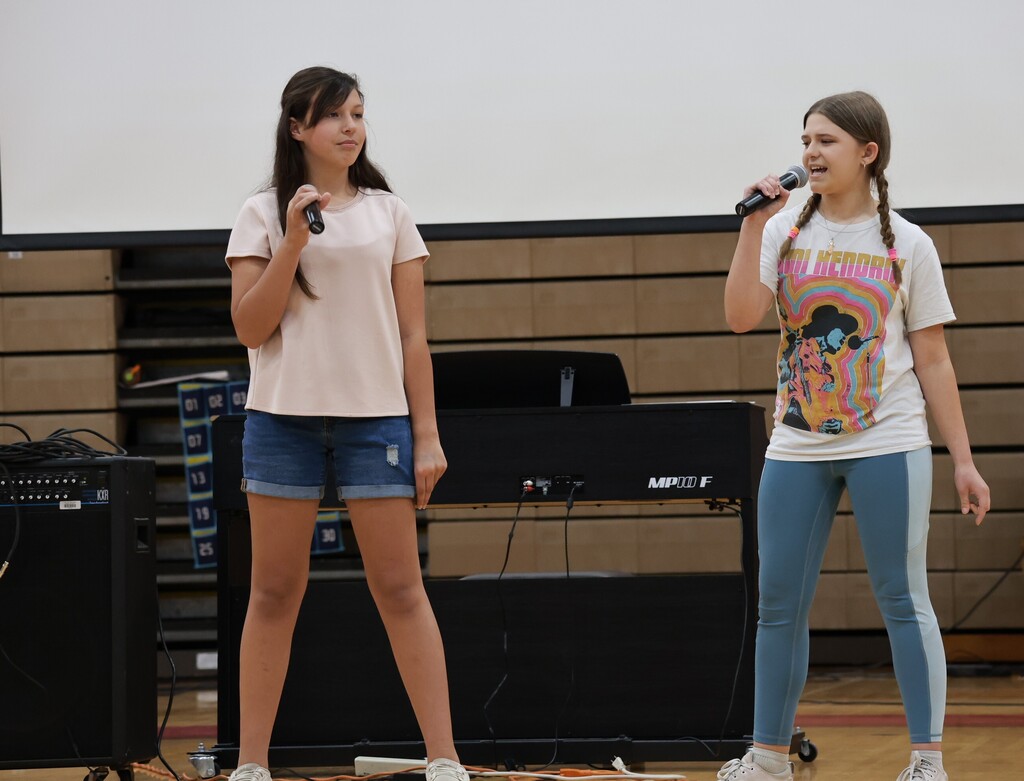 Two TMS students sing at the talent show.