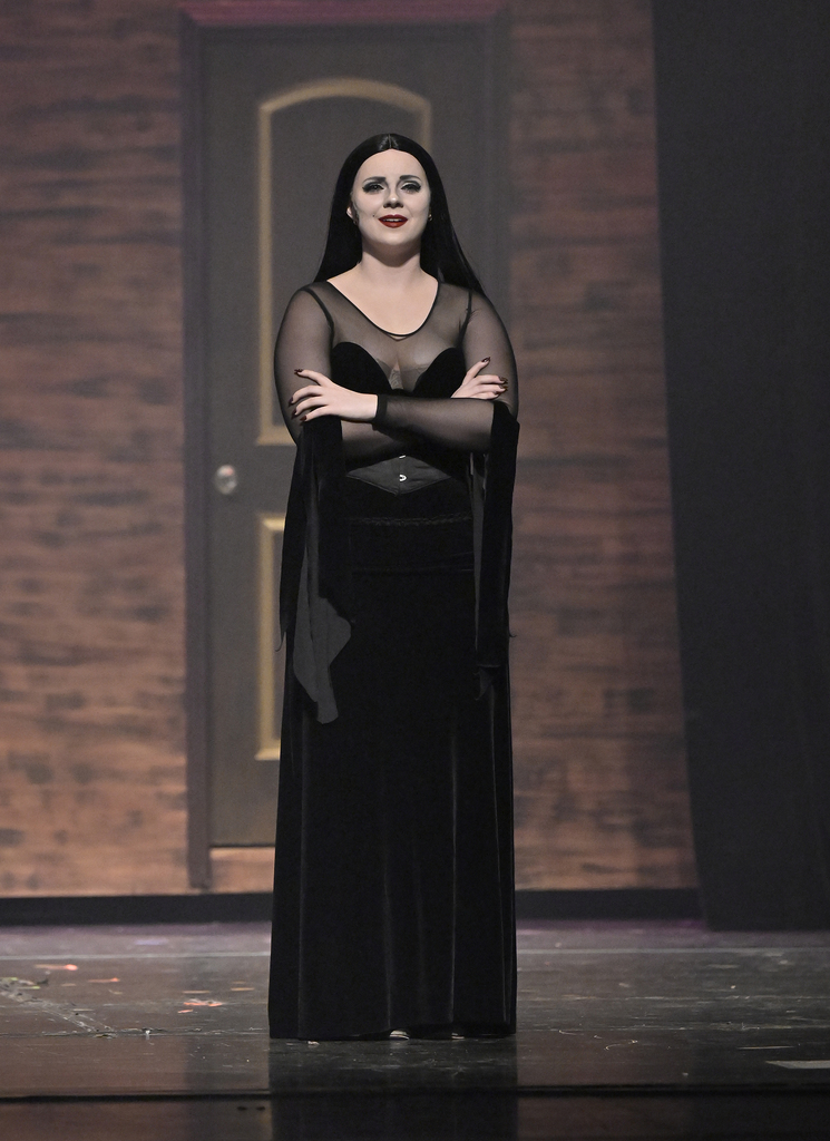 THS graduate Faye Young as Morticia Addams.