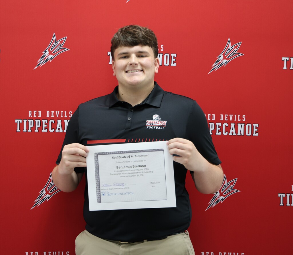 THS Class of 2026 graduate with his local scholarship certificate.
