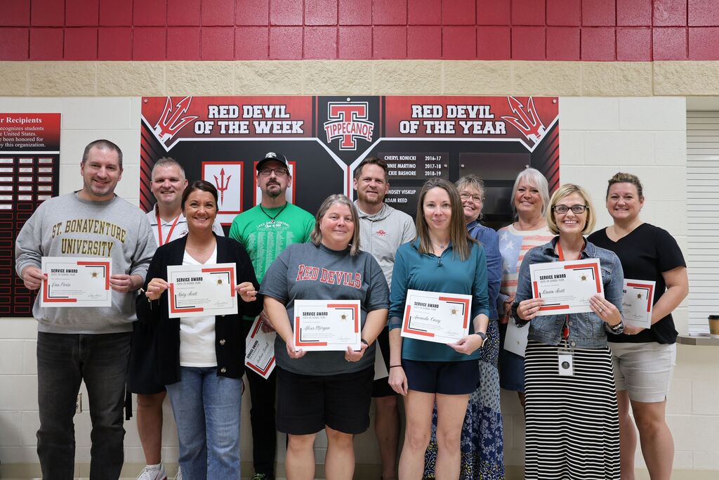 Staff members with the certificates for 20 years of service to Tipp City Schools.