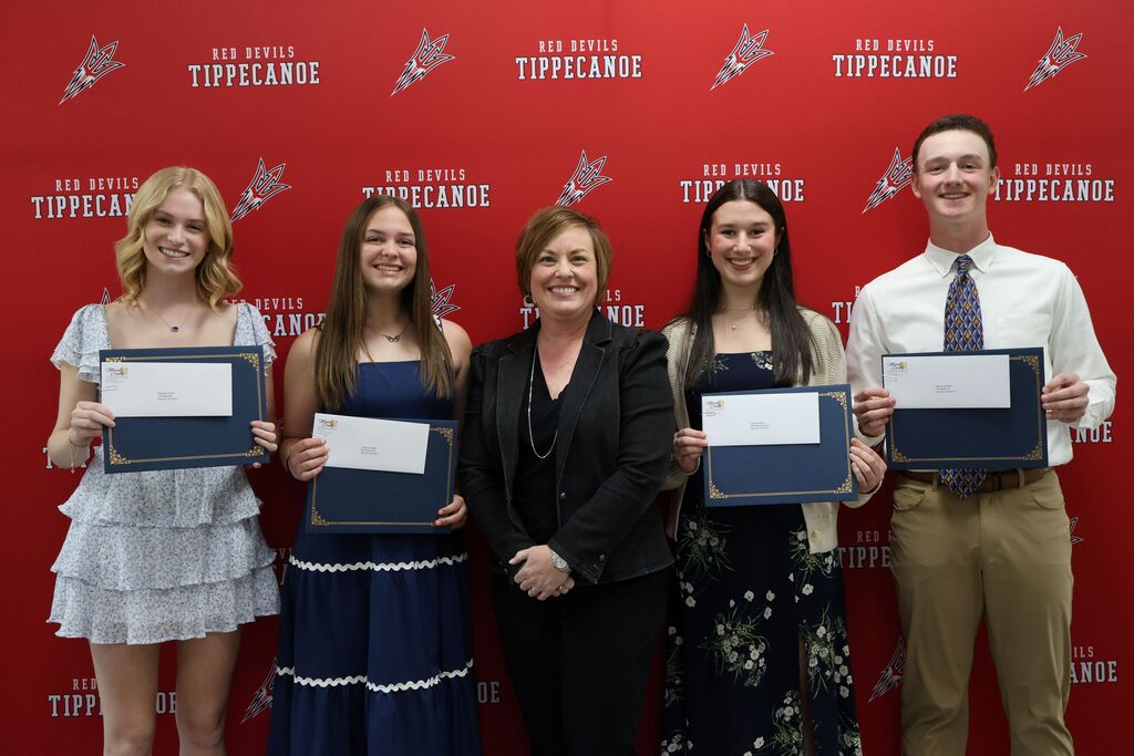 THS Class of 2026 graduates are pictured holding certificates after winning the Thelma Ross Dalton Memorial Scholarship.