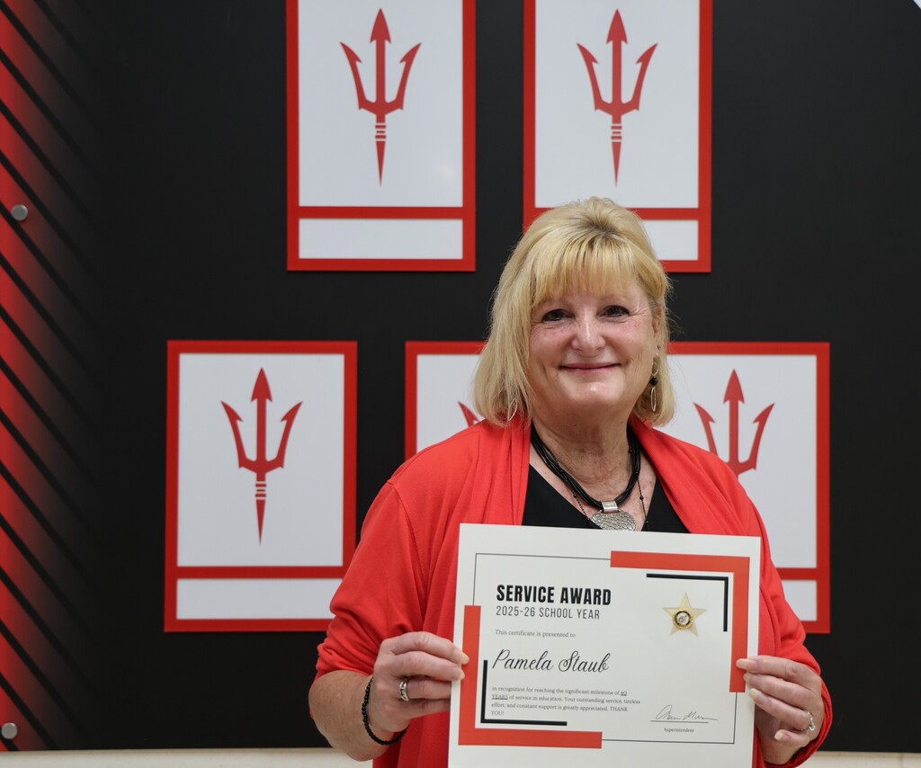 THS teacher Pam Staub honored for 40 years of service.