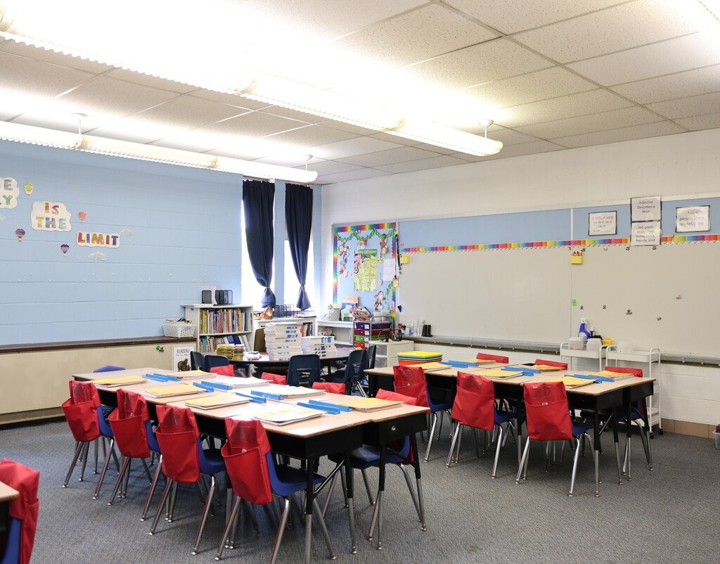 A bright and colorful classroom is ready for students.  
