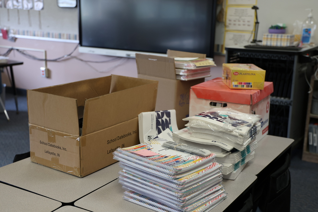 Boxes of supplies are getting sorted.  
