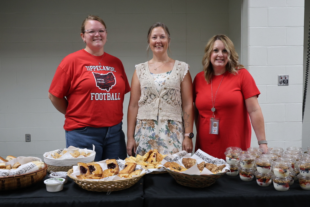 Three staff members who organized the spread for Opening Day.