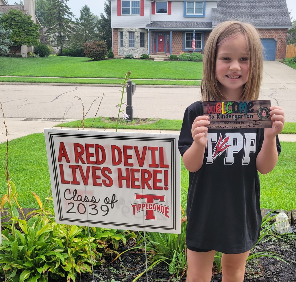 Kindergarten Red Devils shows off the Class of 2039 sign.  