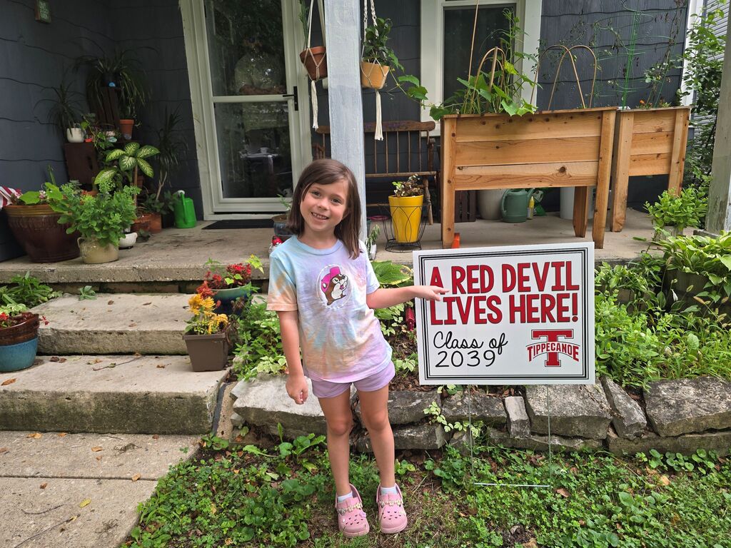 Kindergarten Red Devils shows off the Class of 2039 sign.  