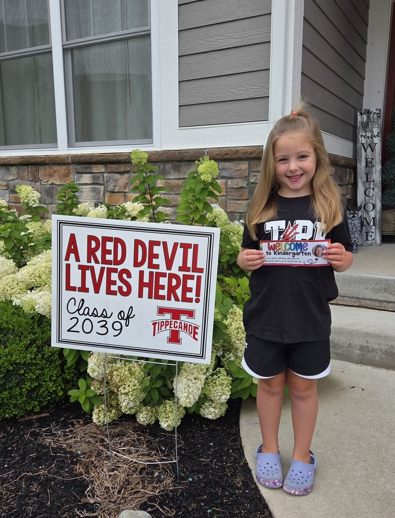 Kindergarten Red Devils shows off the Class of 2039 sign.  