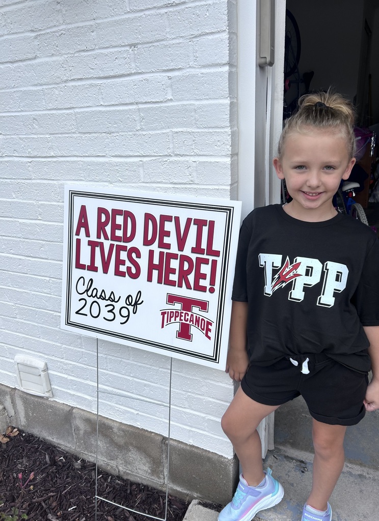 Kindergarten Red Devils shows off the Class of 2039 sign.  
