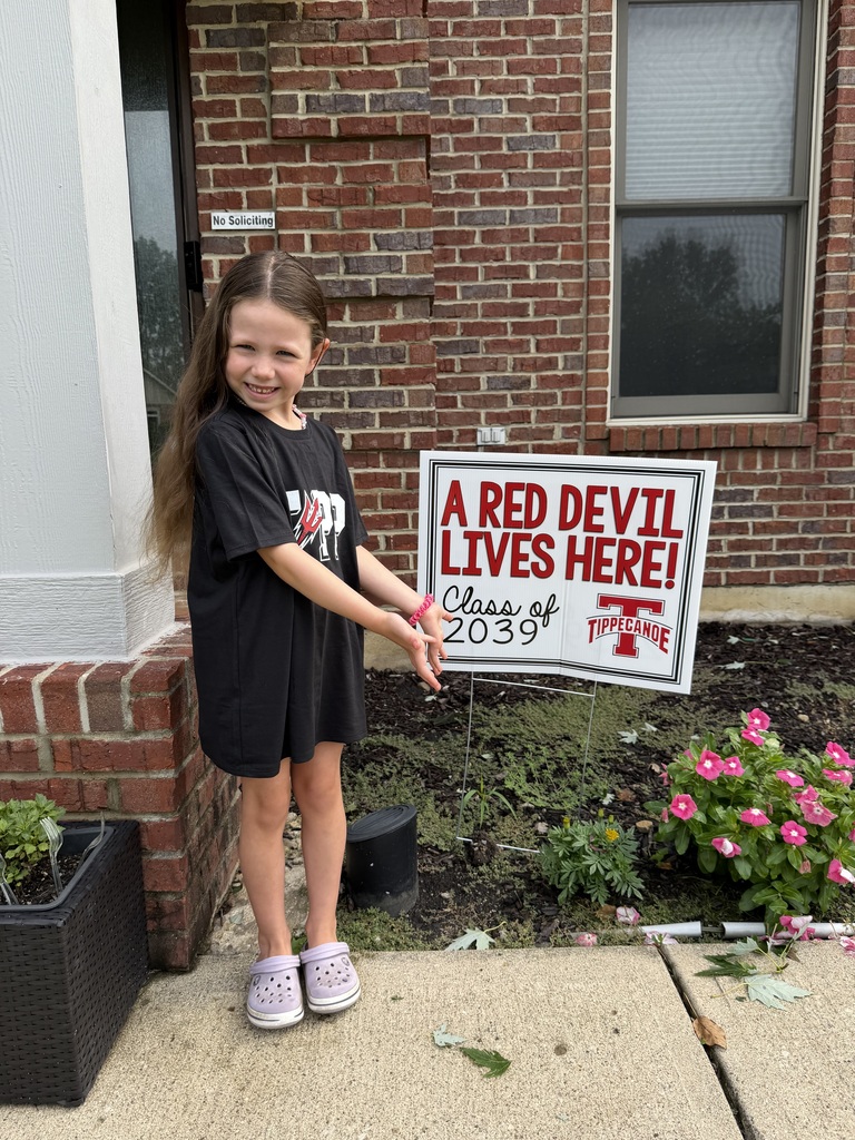 Kindergarten Red Devils shows off the Class of 2039 sign.  