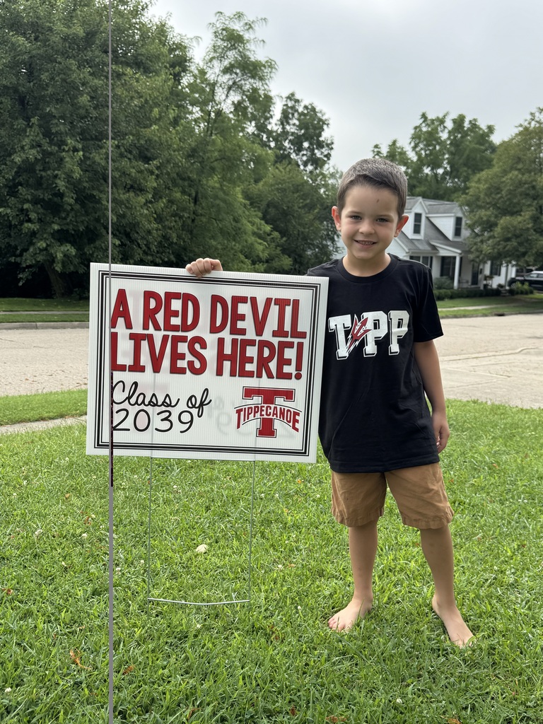 Kindergarten Red Devils shows off the Class of 2039 sign.  