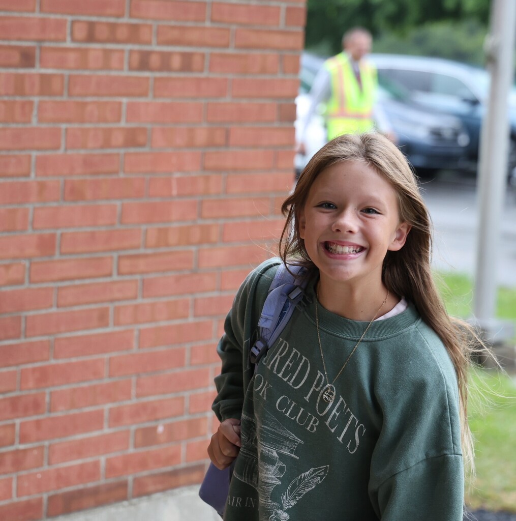A TMS student outside the building on the first day of a new school year.