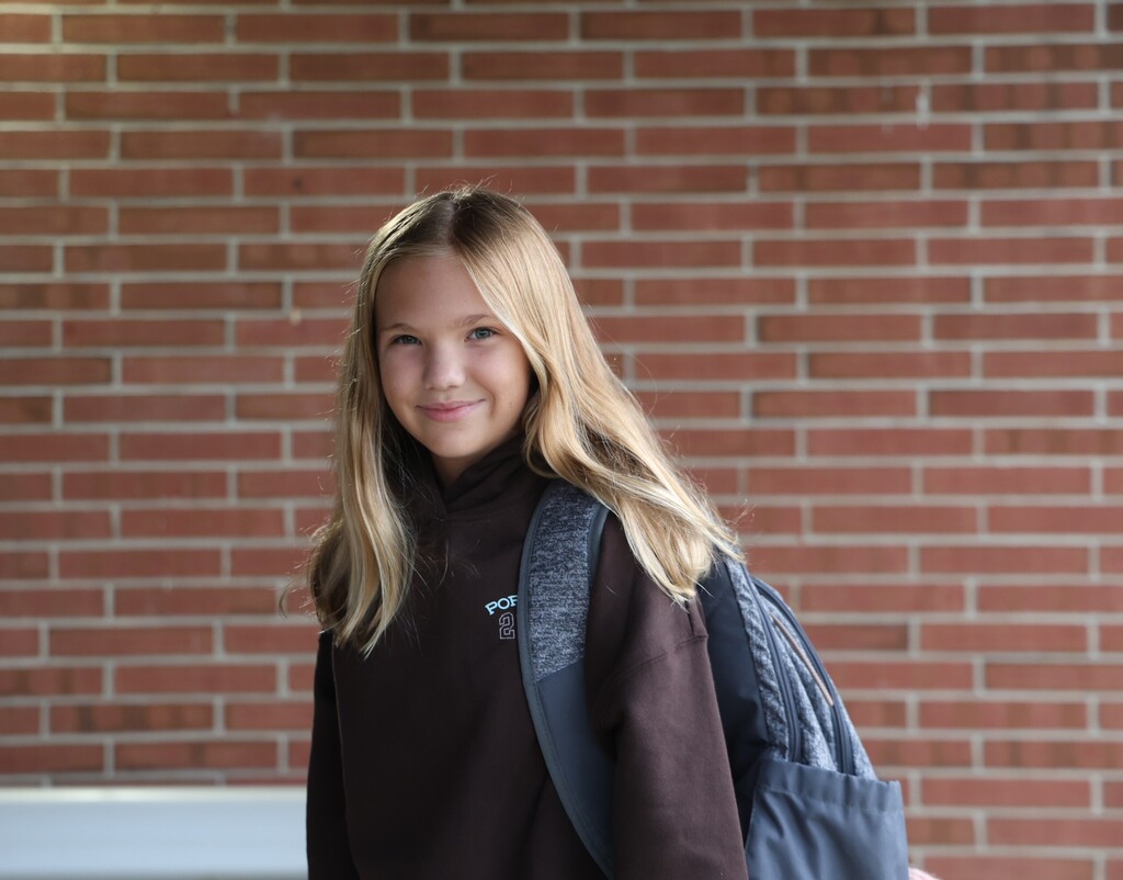 A TMS student outside the building on the first day of a new school year.