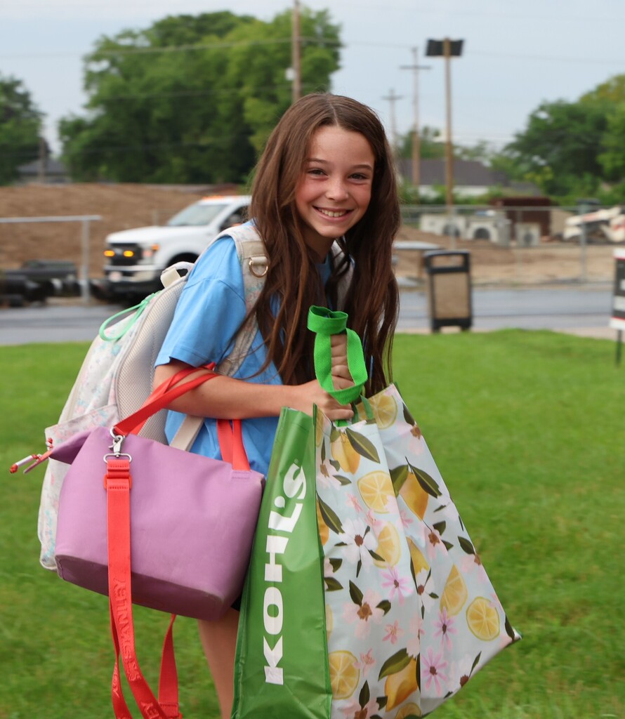 A TMS student outside the building on the first day of a new school year.