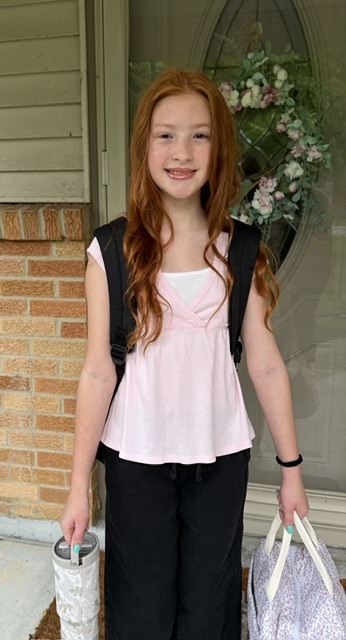 A student on the first day of a new school year.  