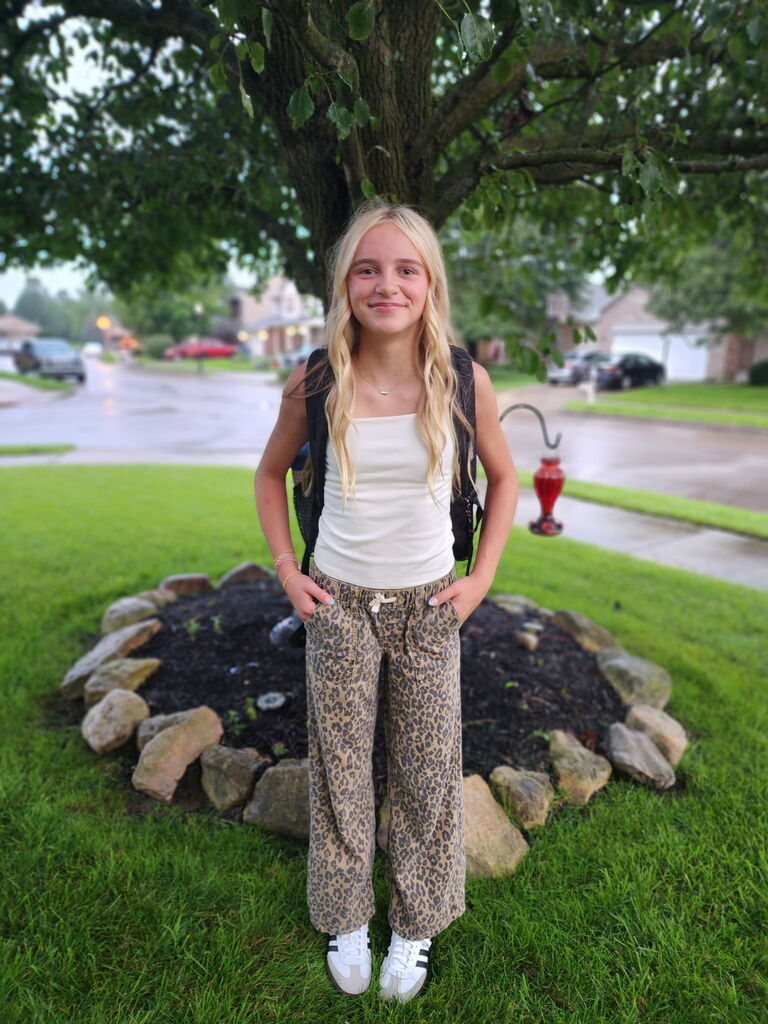 A student on the first day of a new school year.  