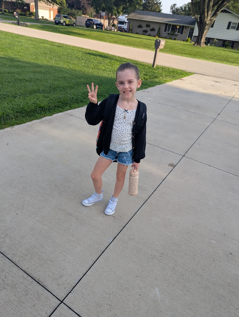 A student poses for the first day picture.
