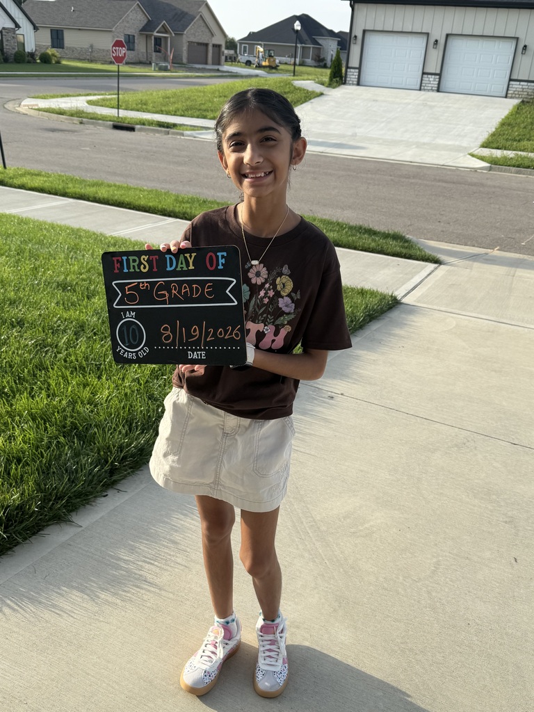 A student poses for the first day picture.