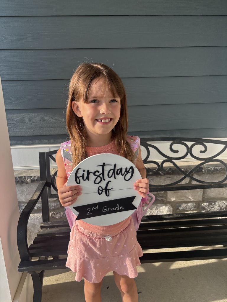 A student poses for the first day picture.