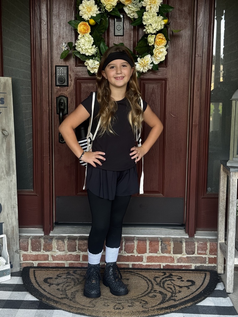 Student posing on the the first day of school.
