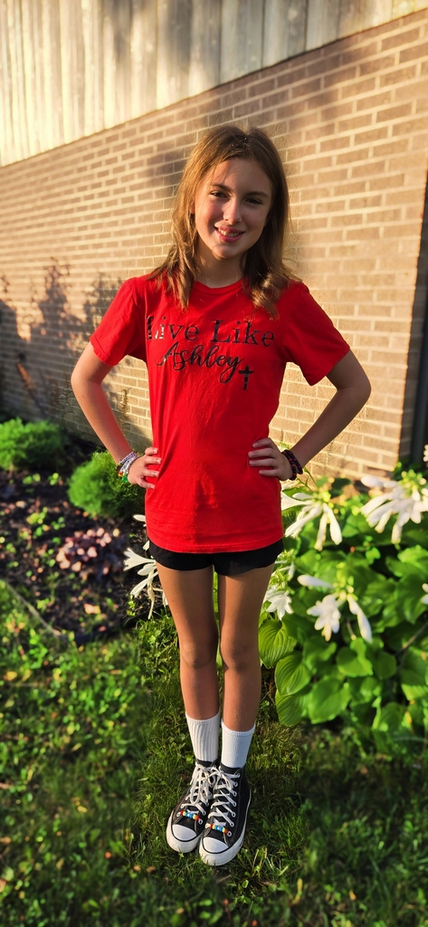 Student posing on the the first day of school.