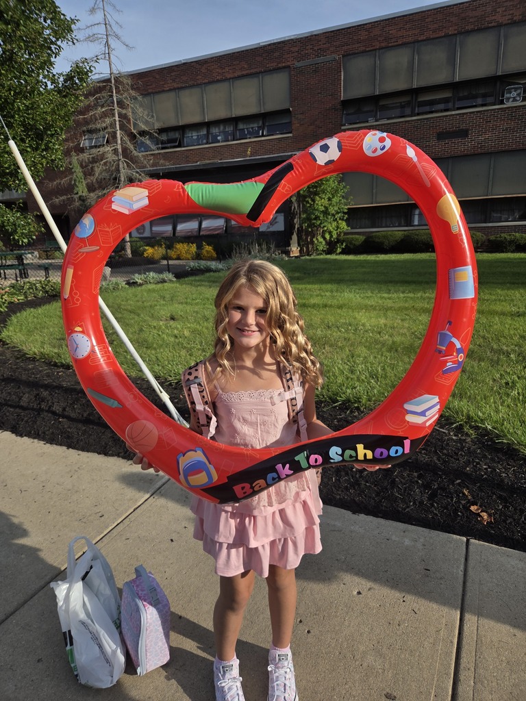 Student posing on the the first day of school.