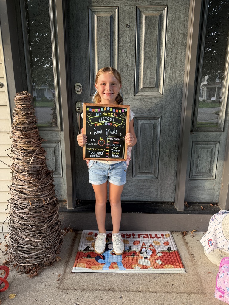 Student posing on the the first day of school.