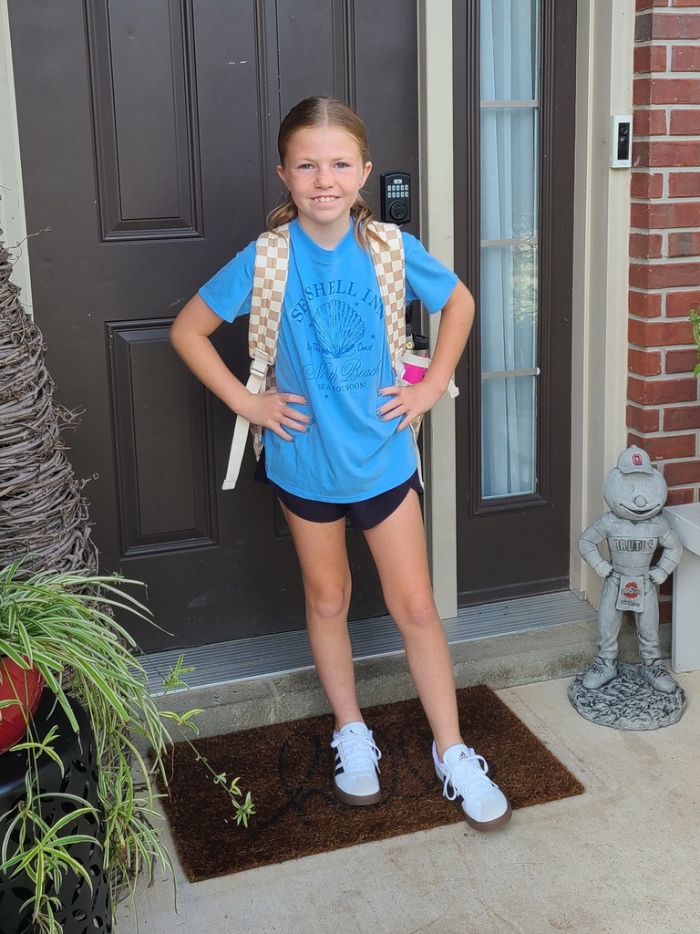 Tipp City Schools students posing for first day photos.