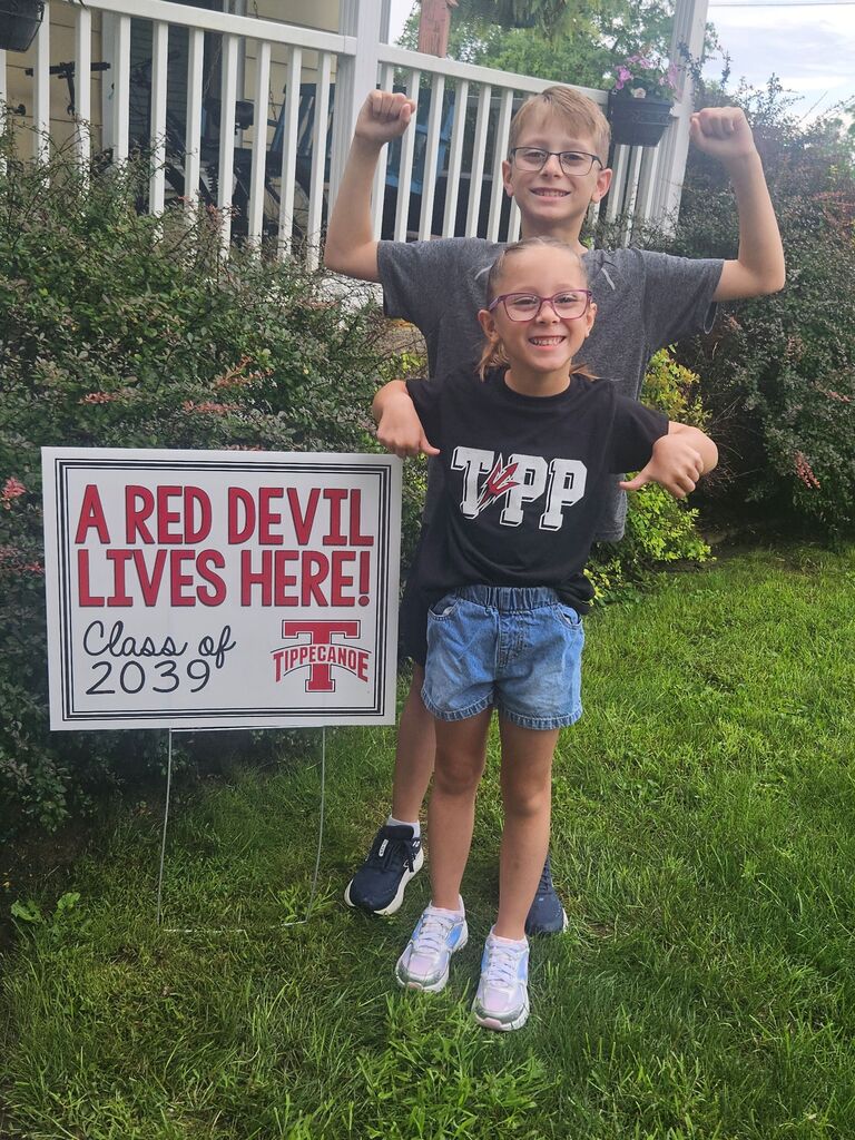 Tipp City Schools students posing for first day photos.