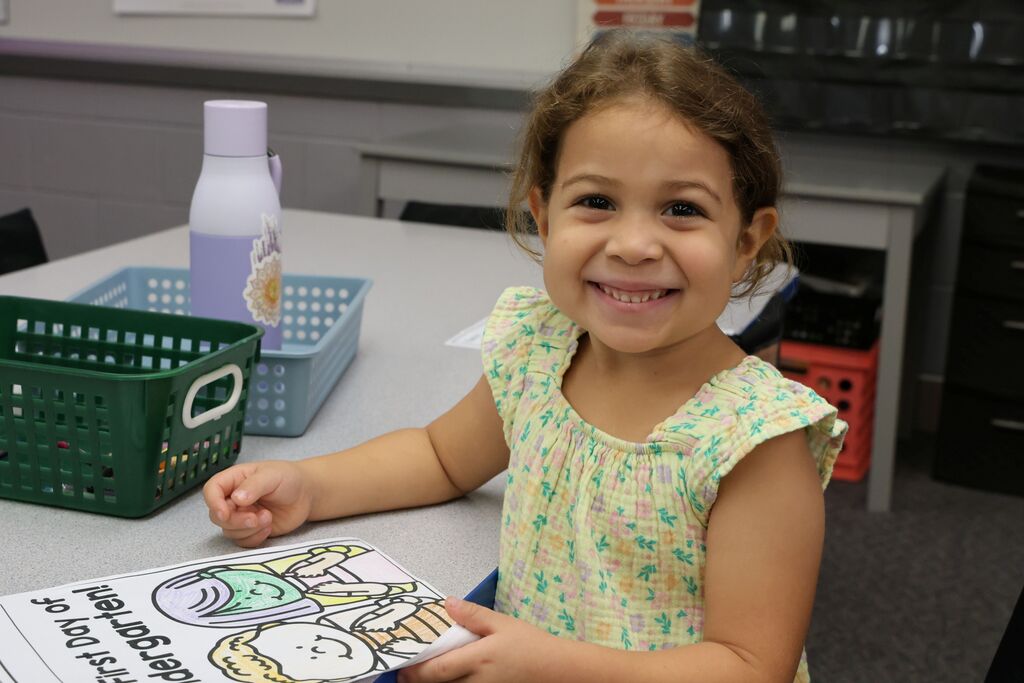A Broadway Elementary student is all smiles on the first day of kindergarten.