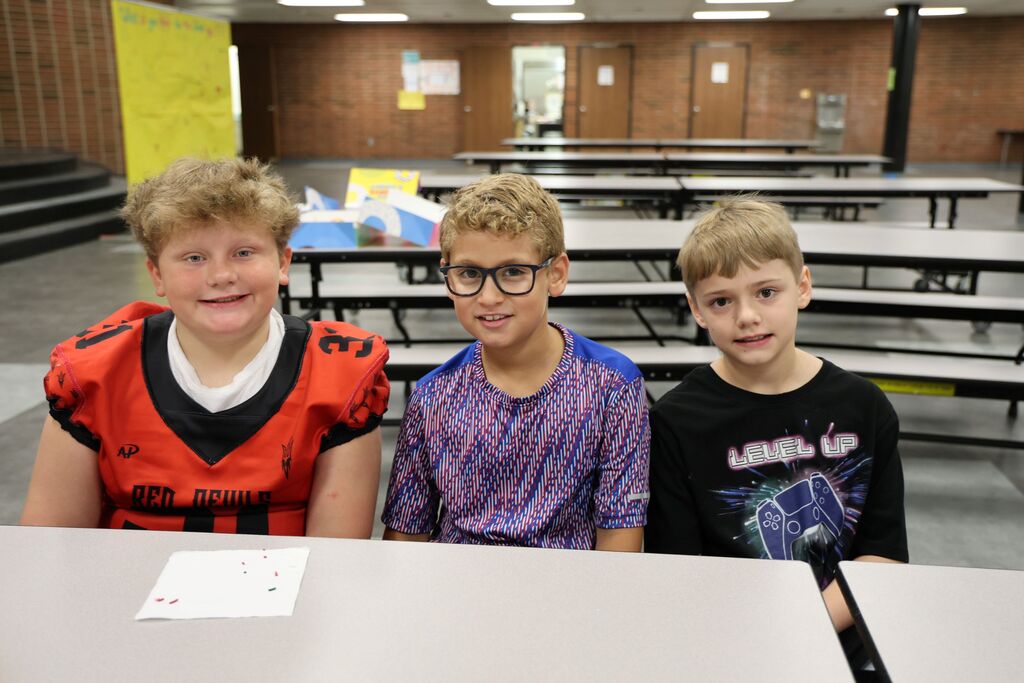 New students at LT Ball enjoy a donut and conversation.