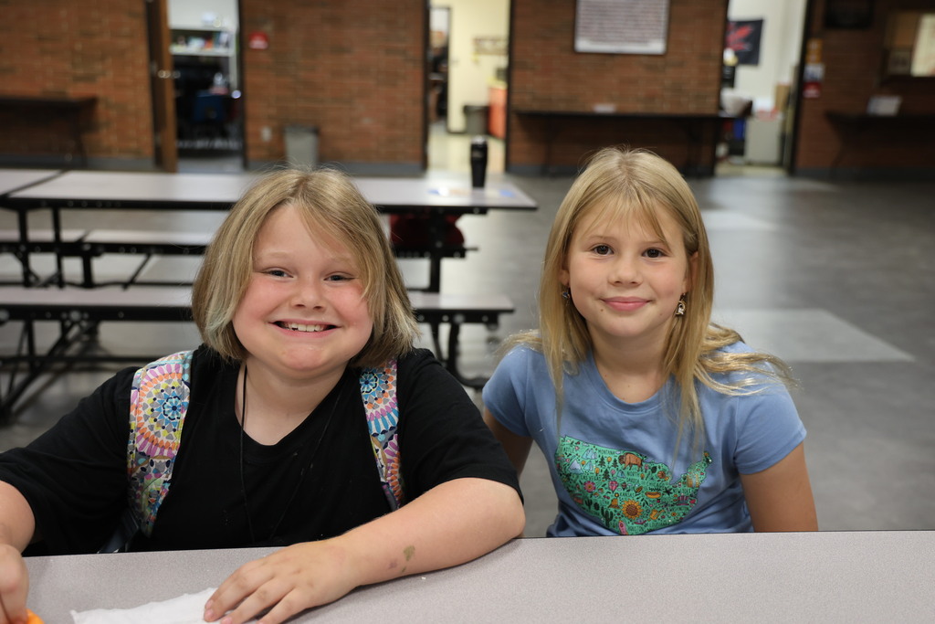 New students at LT Ball enjoy a donut and conversation.