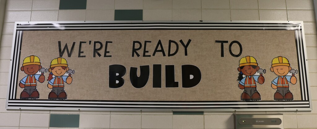 Broadway Elementary bulletin board that says We're Ready to Build. .