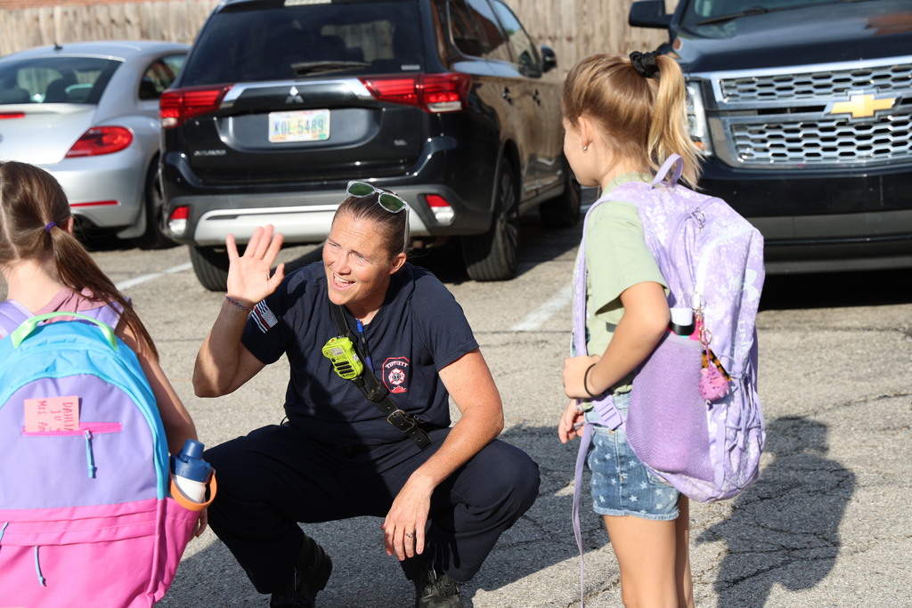 Tipp City Fire, EMS, and Police greet students on the first day of school with fist bumps, hi fives, smiles, and encouragement. 