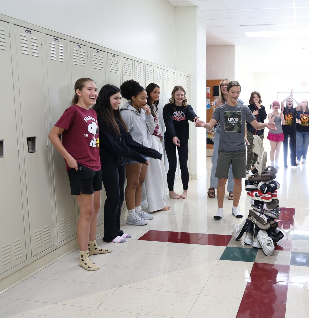 THS students build a tower using their use.