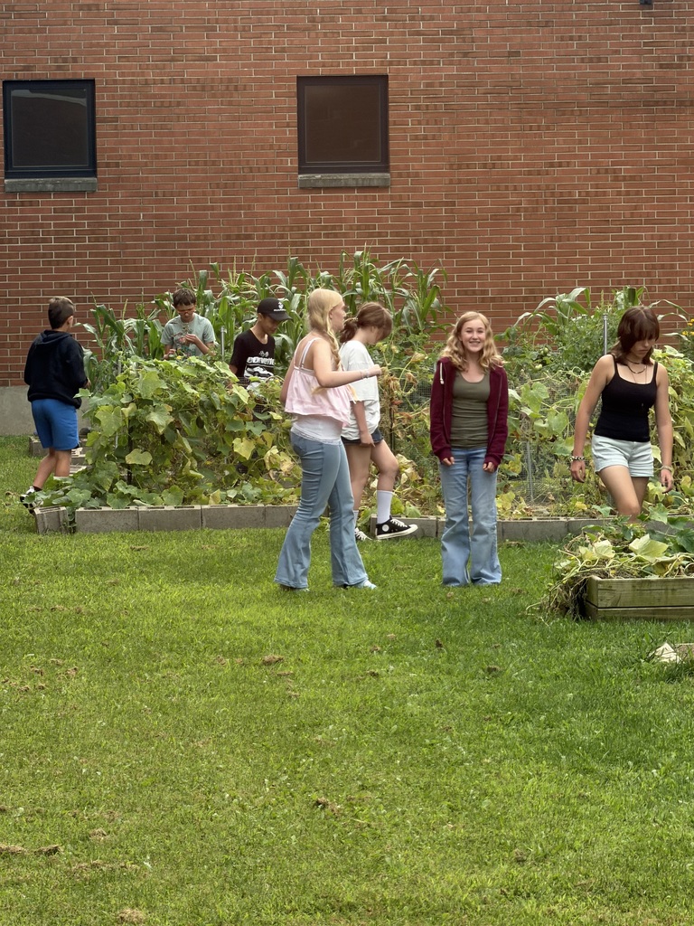 TMS Garden Club inspects the garden. 
